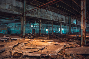 Abandoned ruins of industrial factory building, corridor view with perspective and light, ruins and...