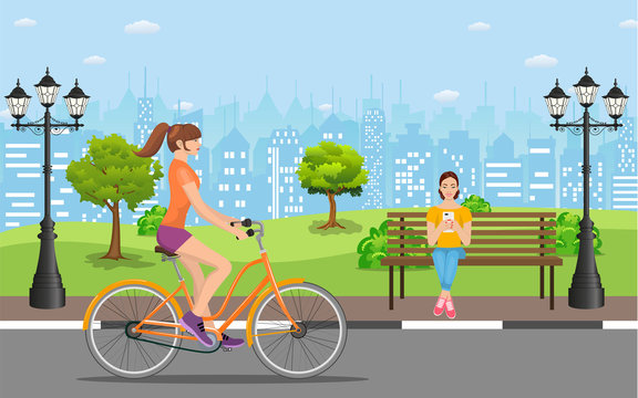 Couple Riding Bicycles In Public Park,