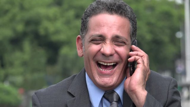 Happy Businessman Using Cell Phone