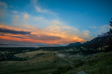 Naklejka na ściany i meble Dramatic sunset over the Rocky Mountains