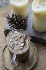 Iced milk mocha on wooden table