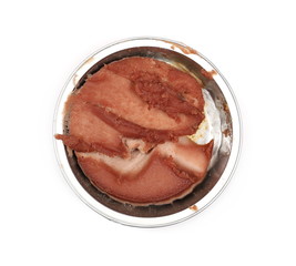 Foul, stale liver pate, pasty spread in tin can isolated on white background, top view