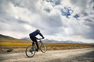 Fototapeta na wymiar Man ride bicycle in the mountain