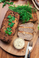 Traditional delicious meat pate with chicken liver on cutting board
