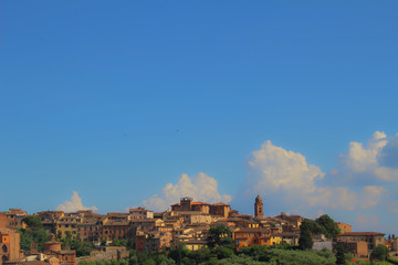 A cityscape view of the picturesque old town of Siena, Italy