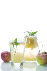 summer sweet cold compote of fresh apples with a sprig of mint