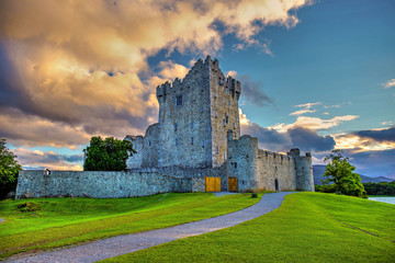 Idyllic landscape of Ross Castle in the Killarney National Park in Ireland. Travel by car through...
