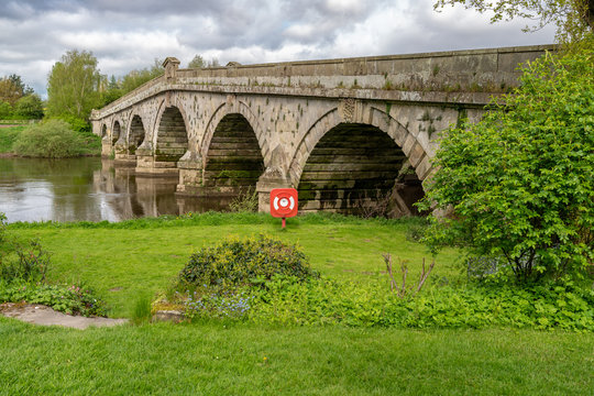 Atcham Old Bridge over the River Severn in Atcham, near Shrewsbury, Shropshire, England, UK