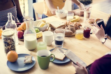 Diverse women having breakfast together