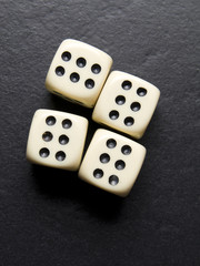 Dice for game on a black background