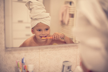 Taking care of her teeth from a young age.