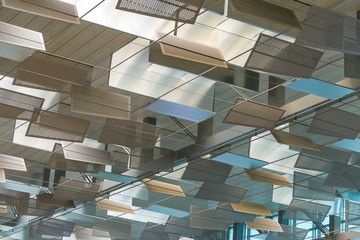 Modern layered panel geometric shape ceiling with adjustable external natural light system in the decoration for energy saving and environmental