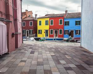Fototapeta na wymiar Colourful houses in Burano Island near Venice, Italy