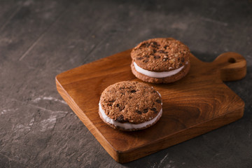 Cookie Ice Cream Sandwich Isolated on rustic wooden table