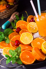 freshly squeezed orange juice with ice in glass