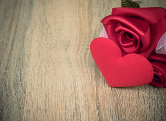 Fototapeta premium Roses and Hearts on Wooden Table Vintage Style.