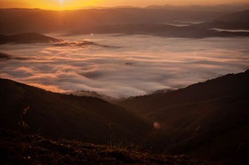 Fog in morning mountains