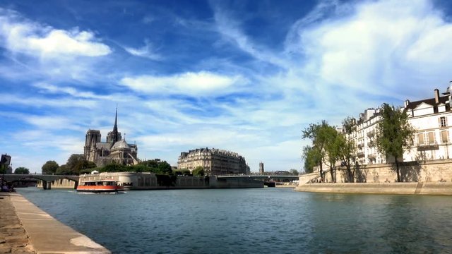 Paris, France, Cruise on Seine river in with Notre Dame on the background.