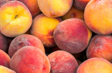 fresh ripe peaches in the box ready for sale
