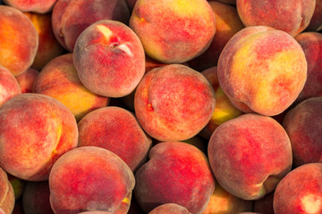 fresh ripe peaches in the box ready for sale
