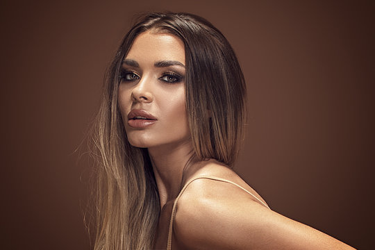 Beauty portrait of sensual brunette girl.