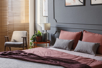 Grey and pink bedroom interior