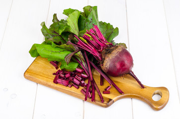 Beet ripe purple with green leaves