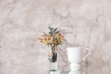 Coffee cup with flower in vintage style.