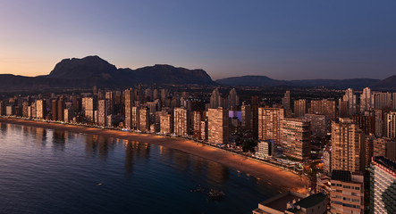 Aerial view of a Benidorm city coastline at sunset. Spain