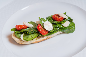 sandwich with mozzarella and tomato