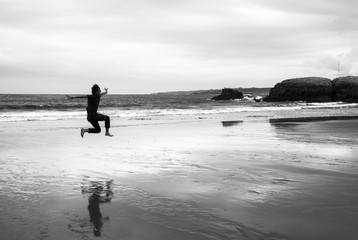 Fototapeta na wymiar young man on a beach