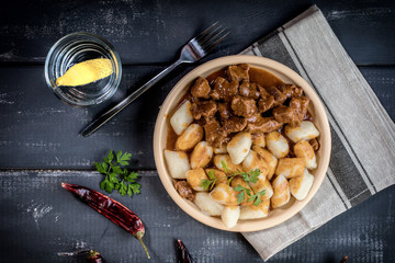 Beef stew with potatoes dumplings.