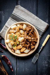 Beef stew with potatoes dumplings.