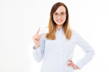 Young smiling woman holding a blank business card isolated on white background. Copy space