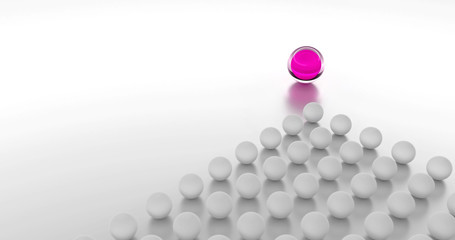 Leadership concept. Pink ball as a symbol for a leader followed by a group or a team