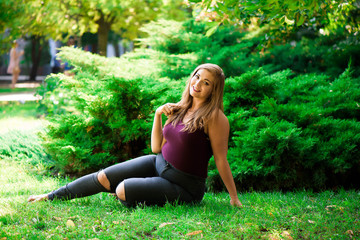 Young beautiful plus size model outdoors, xxl woman on nature.