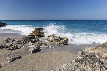 Albanian coast.beautiful view on the  rock sea shore,blue sea and wave.