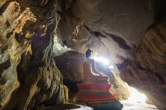 Statue of a sitting Buddha inside the Tham Hoi Cave near Vang Vieng, Vientiane Province, Laos.