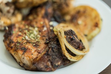 Grilled Steak and Onion on the Plate - Close Up