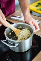chef making risotto