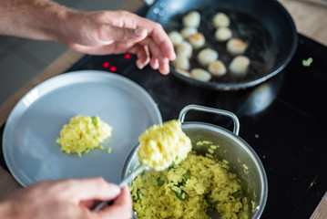 chef making risotto