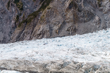 Fototapeta na wymiar Large mountain glacier with steep hill