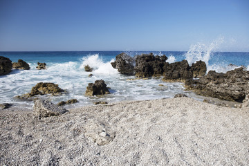Albanian coast.beautiful view on the  rock sea shore,blue sea and wave.