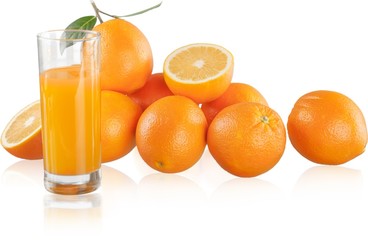 Fresh orange and glass of juice
