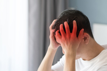 Brain diseases problem cause chronic severe headache migraine. Male adult look tired and stressed...