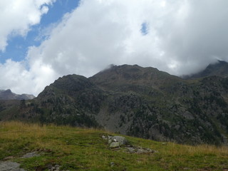 Fototapeta premium summit rock of the mountains in italy south tyrol europe in the clouds