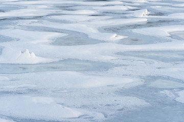 Detail of frozen sea ice in Arctic bay, Balsfjord, Norway.