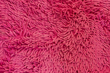 red carpet, red fabric texture background, closeup