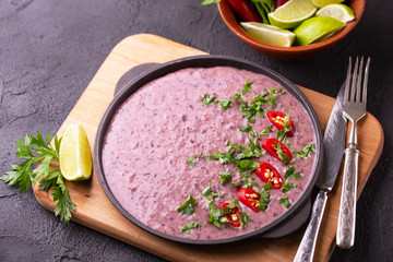 Mexican red bean puree soup with lime, parsley and chilli pepper.