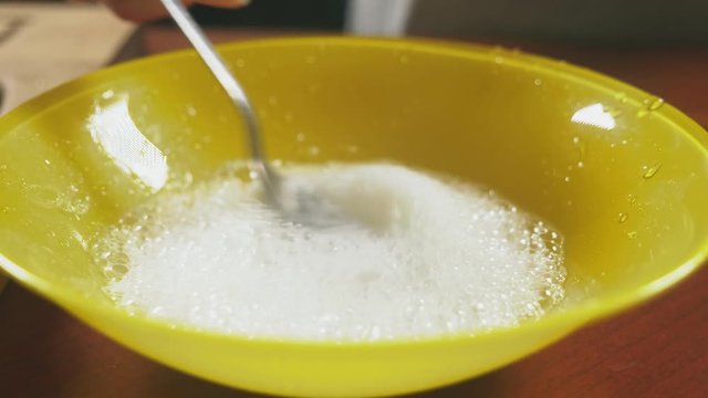 soda slaked in lemon juice. close-up 4k, dolly shot